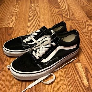 Lightly worn lace up low top black van sneakers. Womens size 7